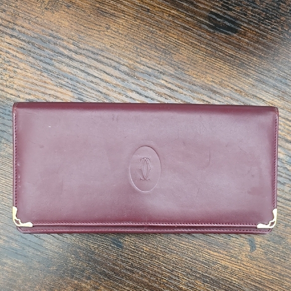Cartier Handbags - Cartier Maroon Leather Card Holder with Gold Logo
